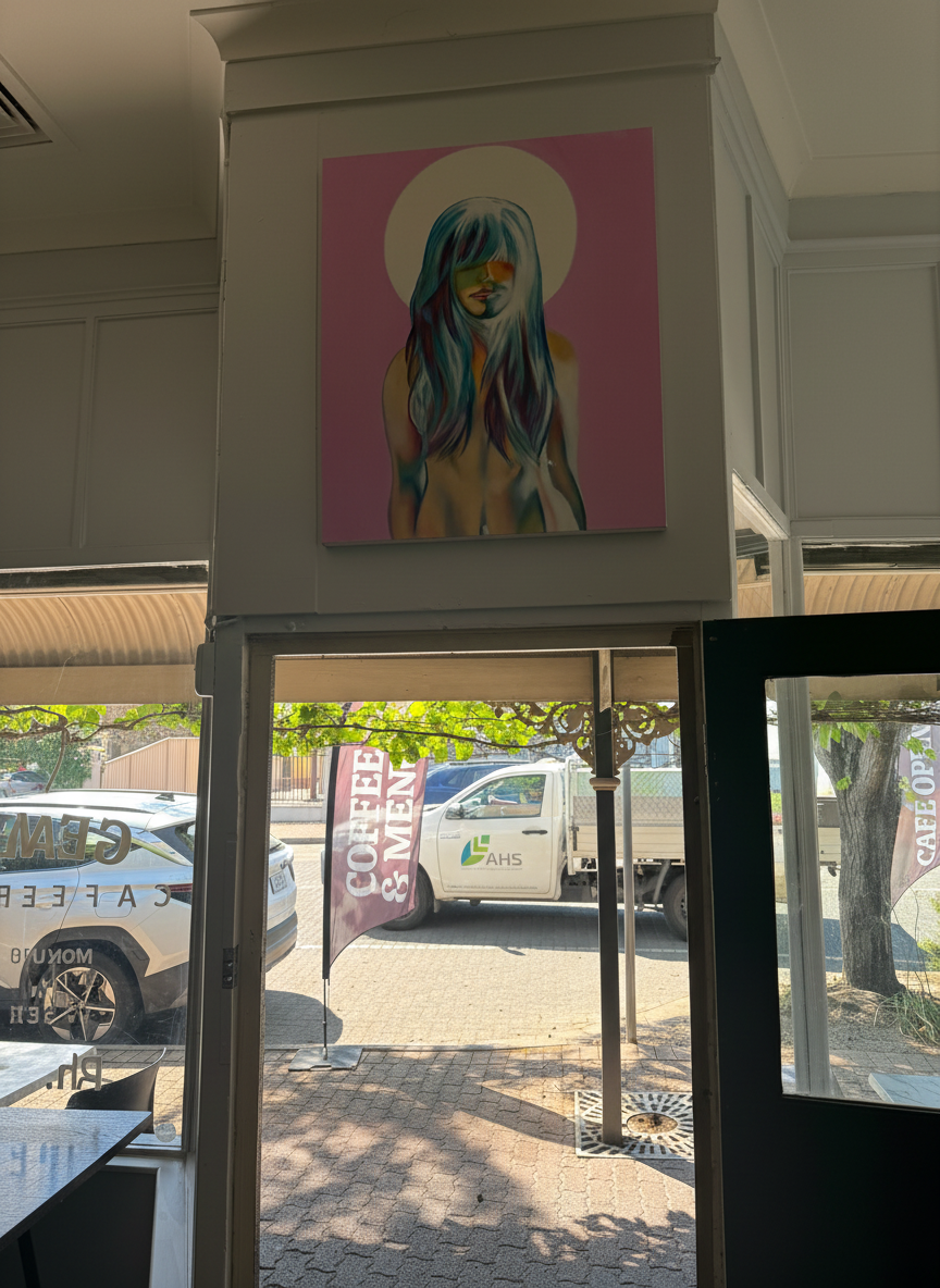 Local artwork displayed at George's Café entrance
